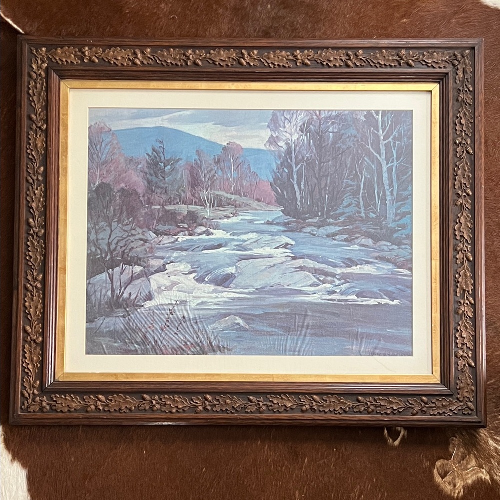 Vintage framed landscape print with carved oak leaf frame.